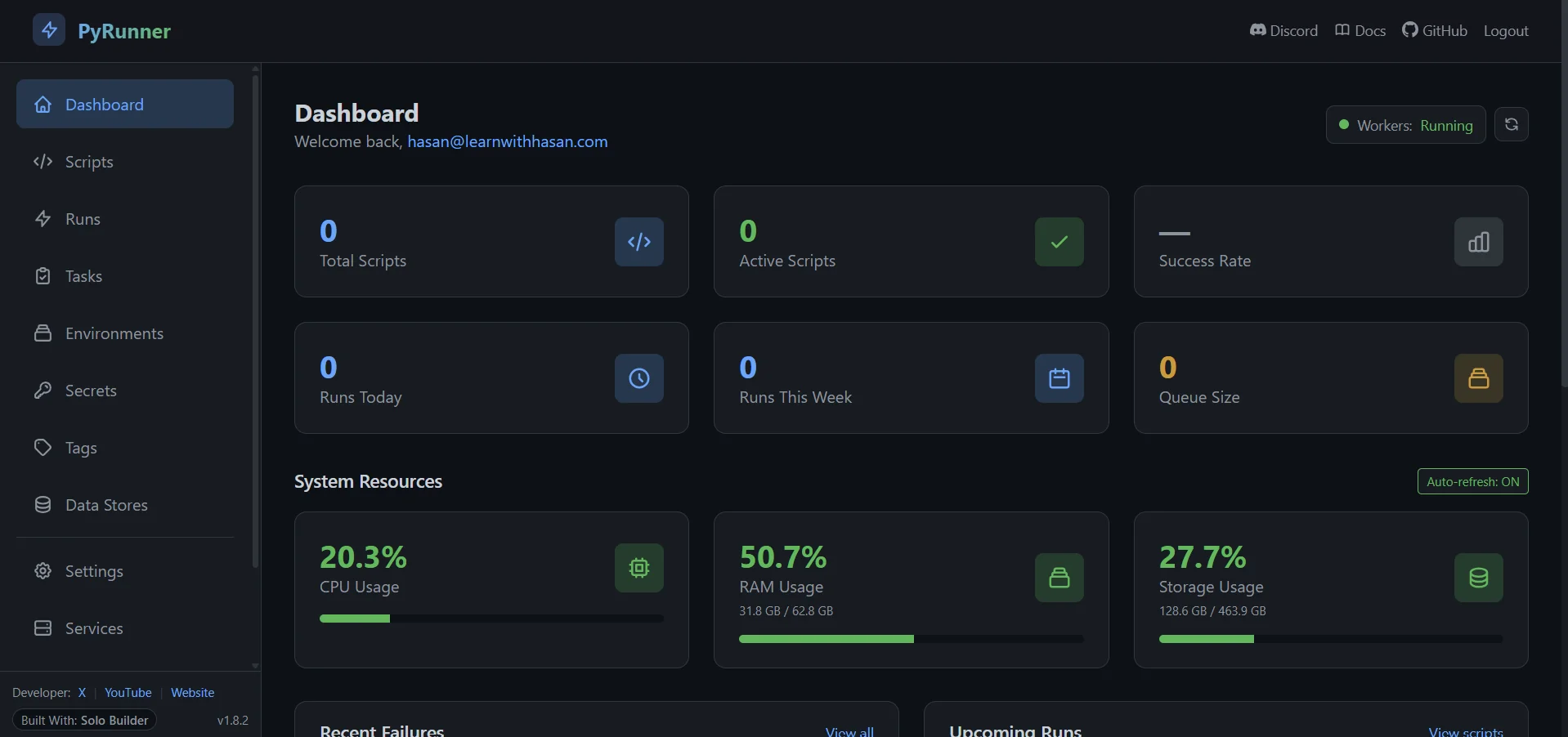 The PyRunner dashboard after first login: dark theme with sidebar (Dashboard, Scripts, Runs, Tasks, Environments, Secrets, Tags, Data Stores, Settings, Services) and stat tiles for Total Scripts, Active Scripts, Success Rate, Runs Today, Runs This Week, Queue Size, plus a System Resources panel.